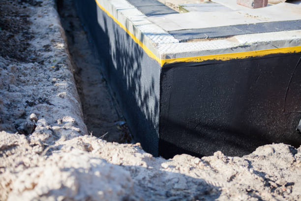 Professional Waterproofing technician working in Freeport, MI